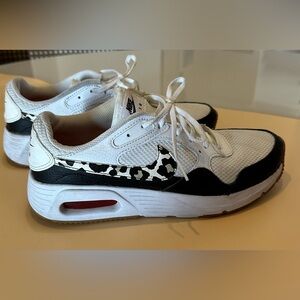 Nike sneakers w/ animal print detail.